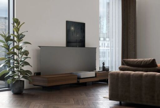 Motorized projection screen integrated into a custom home cinema Motorized projection screen integrated into a custom home cinema