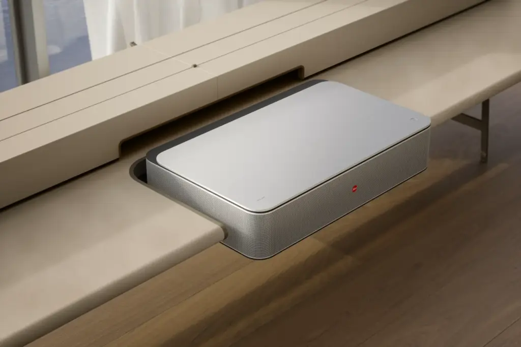 Bespoke furniture designed to discreetly integrate a home cinema projector into a living space Bespoke furniture designed to discreetly integrate a home cinema projector into a living space